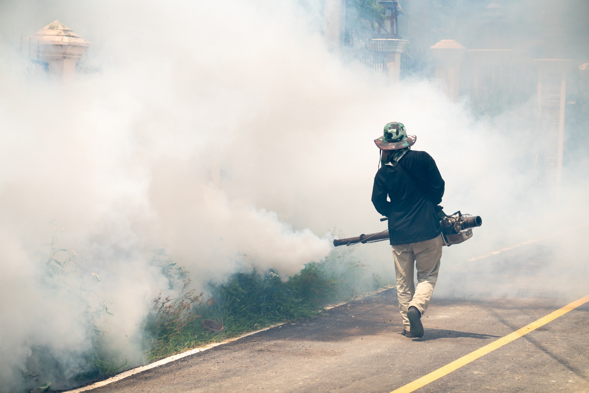 man use fumigation mosquitoes machine for kill mosquito carrier of Zika virus and dengue fever